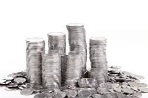 White Background Currency Stampe: Stack of coins isolated on a white background