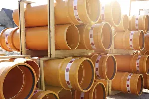 New Building In Germany Stampe: Stack of KG pipes on a construction site in the Mutterstadt development area