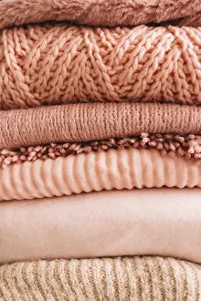 Handicraft Clothing Stampe: Stack knitted sweaters