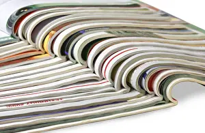 Bright White Background Cutout Stampe: Stack of magazines isolated on white background