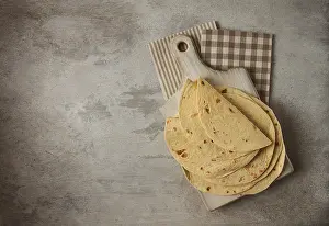 Mexican Tortillas Stampe: A stack of Mexican tortillas, on a gray table