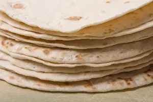 High Angle Food Photography Stampe: A stack of Mexican tortillas, on a gray table