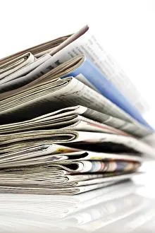 Studio Shot Of Papers Stampe: Stack of newspapers