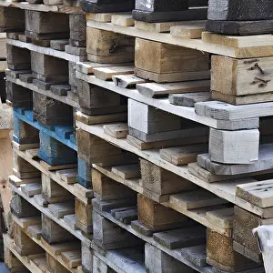 Industrial Building Stampe: A stack of old wooden pallets for loading
