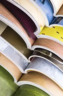 Environmental Awareness Photo Stampe: Stack of open magazines