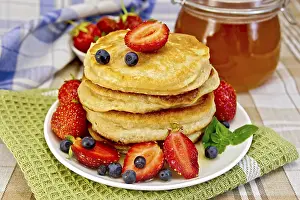 Homemade Pancake Recipes Stampe: A stack of pancakes with strawberries