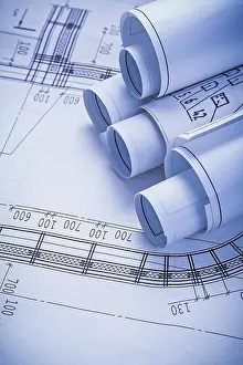 Rolled Up Papers Stampe: Stack of rolls blueprints close up
