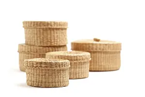 White Studio Setup Stampe: Stack of various sized wicker baskets isolated on white