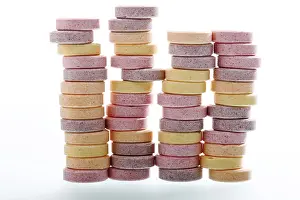 Colourful Food Photography Stampe: Stacks of multicoloured grape sugars