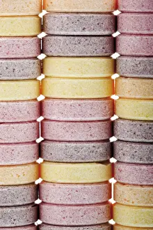 High Calorie Sweets Stampe: Stacks of multicoloured grape sugars