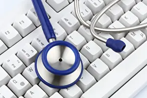 Deserted Computer Setup Stampe: A stethoscope on a computer keyboard
