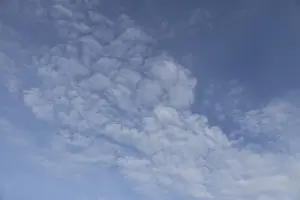 Blue Cloudy Sky Stampe: Stratocumulus white clouds in a blue sky