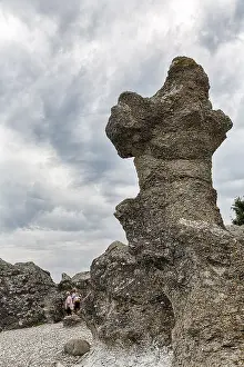 Raukar Limestone Column Stampe: Stroller next to bizarre rocket