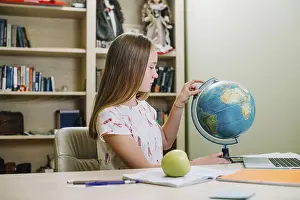 Educational Institution Training Stampe: Student posing with globe table
