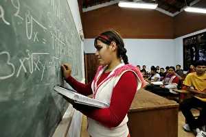 Youth Education Stampe: Student solving a math equation