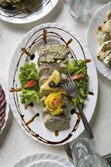 Gastronomy Meal Stampe: Stuffed fish on the table in the restaurant
