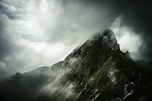 Central Europe Mountain Peaks Stampe: Summit ridge with dramatic clouds