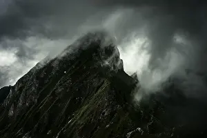 Bernese Oberland Mountains Stampe: Summit ridge with dramatic clouds