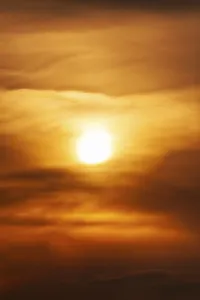 Deserted Evening Sky Stampe: Sun behind cloud cover, sunset