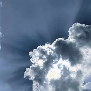 Cloudy Skies Photography Stampe: Sun behind clouds