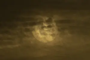 Cloudy Skies England Stampe: Sun behind thin clouds in the sky