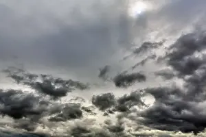 Ullapool Scotland Stampe: Sun shining through cloud cover