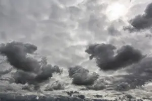 Orkney Islands Scotland Stampe: Sun shining through gap in clouds