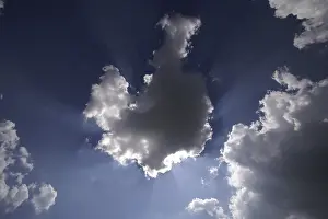 Cloudy Atmosphere Stampe: Sun behind white clouds