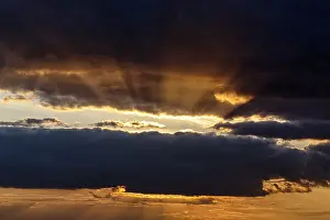 Scandinavian Cloudy Skies Stampe: Sunbeams behind clouds, dramatic evening sky