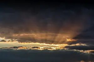 Swedish Evening Sky Stampe: Sunbeams behind clouds, dramatic evening sky