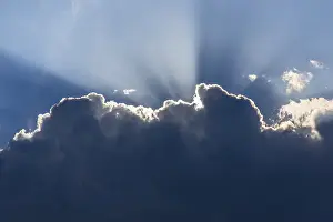 Light Beam Photography Stampe: Sunrays behind a cloud, Germany