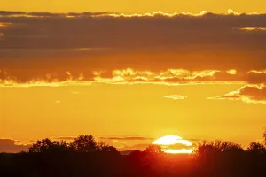 Cloudy Skies Central Europe Stampe: Sunrise, sky and clouds orange, Thuringia, Germany