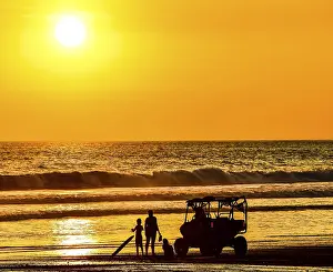 Coastal Evening Light Stampe: Sunset on beach