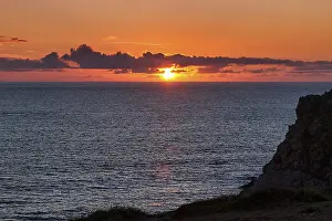 Steep Cliff Europe Stampe: Sunset behind clouds on the Atlantic Ocean