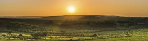 Granite Rock Formations UK Stampe: Sunset over fields in Haytor Rocks