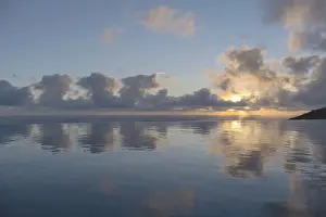 Sunset In Southern Europe Stampe: Sunset reflected in an infinity pool