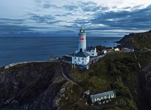 British Coastal Landscape Stampe: Sunset over Start Point Lighthouse from a drone