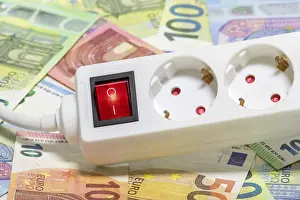 Electricity Tariff Prices Stampe: Switchable socket strip, euro banknotes
