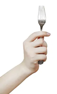 Bright White Background Food Stampe: Table fork in hand against white background