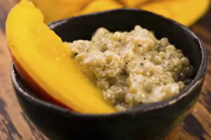 No People Eating Food Stampe: Tapioca pudding with slices of mango
