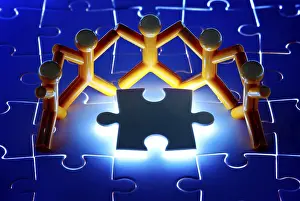 Teamwork Concept Stampe: Team work on solving puzzle problem