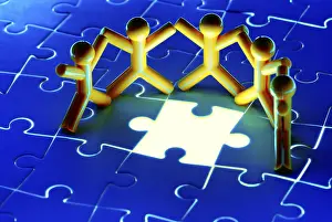 Teamwork Concept Stampe: Team work on solving puzzle problem