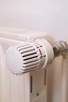 Energy Saving Stampe: Thermostat at heating elements