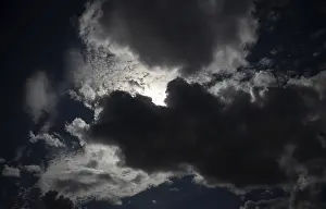 Thunderstorm Mood Europe Stampe: Thundercloud pushes in front of the sun