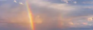 Panorama Evening Sky Stampe: Thunderclouds in evening light with rainbow