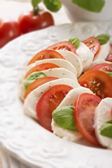Tomato Mozzarella Stampe: Tomato with mozzarella cheese - selective sharpness-deep