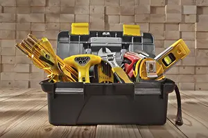 Measuring Tape Concept Stampe: Various work tools in a small black toolbox