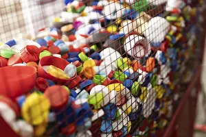 Urban Waste Management Stampe: A vibrant array of plastic caps