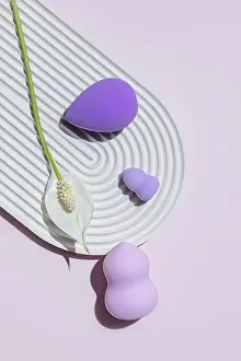 Skin Care Products Stampe: Top view of assorted makeup egg sponges