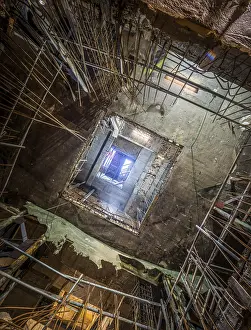 Construction Worker Safety Gear Stampe: View of a building under construction